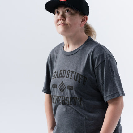 Full front-facing image of model wearing the Do Hard Stuff Alma Mater tee