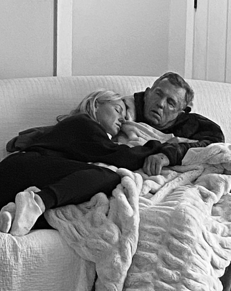 Brooke, co-founder of Do Hard Stuff, resting beside her father, capturing the quiet strength and deep resilience behind the movement.