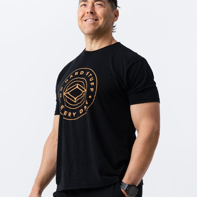 Angled view of model in Do Hard Stuff Every Day t-shirt