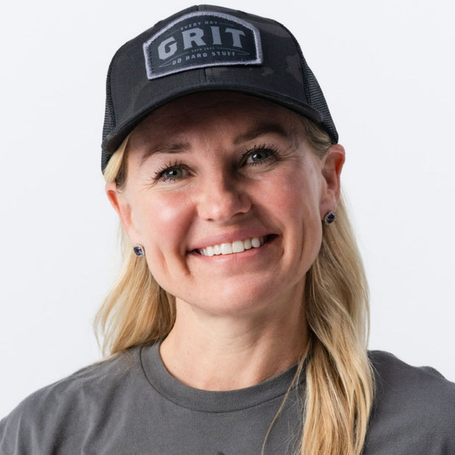 Woman wearing Do Hard Stuff GRIT Hat in Magic Camo – empowering everyday apparel