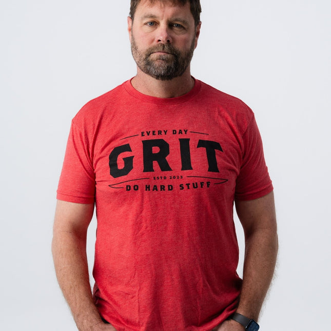 Full front view of red Do Hard Stuff Grit Tee with grit lettering.