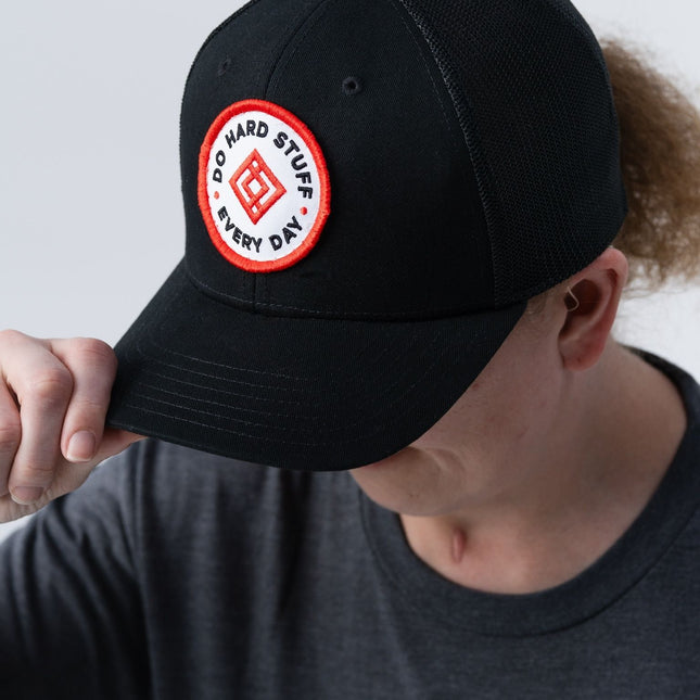 Side view of the Inner Circle Hat showing patch and mesh back.