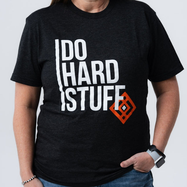 Woman wearing Do Hard Stuff Mantra Tee with hands on hips